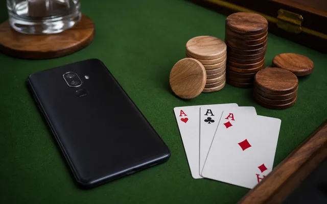 Source-check desk with hash notebook and Teen Patti card evidence stamps